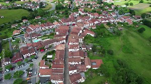 Espelette, France - Aerial flyover view above the French village of Espelette in southern France