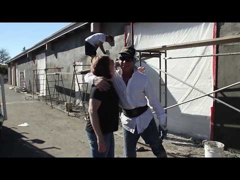 Graco pumps spray the stucco on walls.
