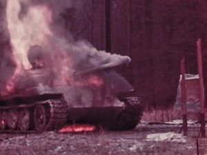Soviet T-55 tank burns after an armor-piercing shot through the glacis during US trials in 1976