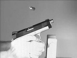 1911 Commander 45 High Speed Video of Live Fire