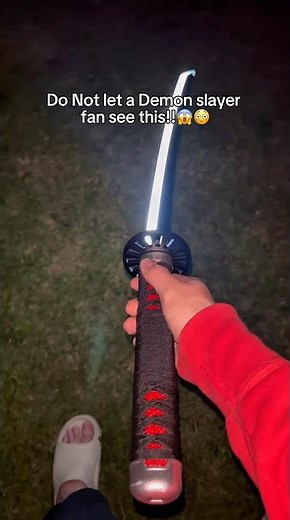 MY DEMON SLAYER SWORD GLOWS 😱✨ #demonslayer #anime #otaku #tanjiro #rengoku #viral #gift #giftideas