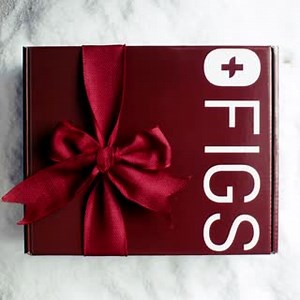 Magical things happen when you gift FIGS. 🎁 Tiny, merry people not included, but Burgundy boxes are! | FIGS