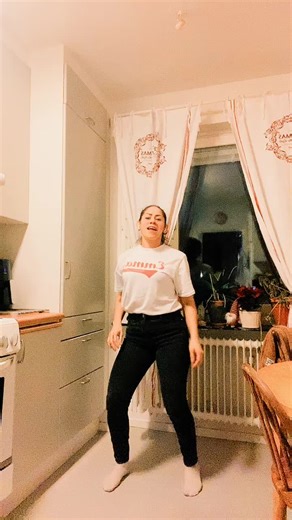 Fun Dance Routine in a Cozy Kitchen Setting