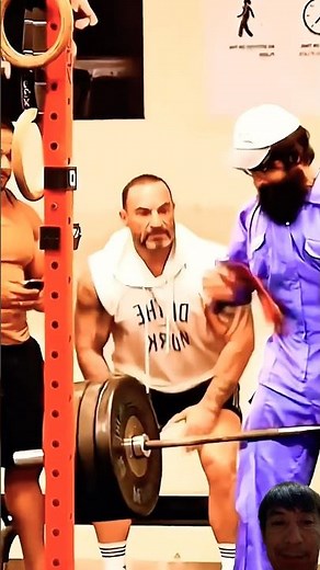 Watch as Anatoly walks into the gym and shocks everyone by lifting heavy with just one hand. Witness