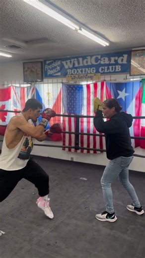 Alan Garcia firing laser sharp punches while working pads with Coach Gee