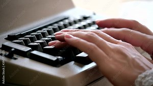 Typewriter. Woman typing on old vintage retro typewriter, fingers press keys. News, media or communication concept. Close up shot. Macro, Video 4K
