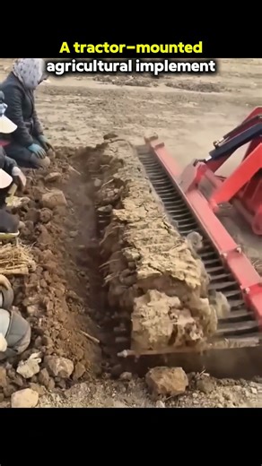 A tractor-mounted agricultural implement