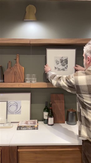 Our Chicago team created the ultimate at-home bar using our Amherst storage cabinet with @trueresidential refrigeration and sleek Foshay and Float wall shelves 😍 | Room & Board