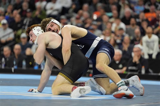 Penn State wrestlers win 9 of 10 bouts to pin worst-ever home loss on Iowa, 32-3