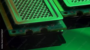 DDR RAM sticks on green light mirror background. Double Data Rate Random Access Memory. Computer memory module with contact pins. Heat spreader