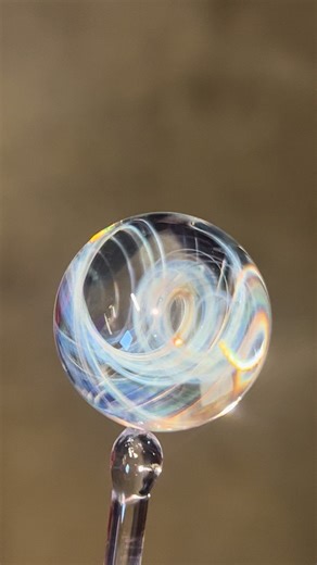 marble we made together on the live stream. this guy is $20 shipped anywhere in the united states. thanks yall #glass #marble #swirl #sparkle #artwork