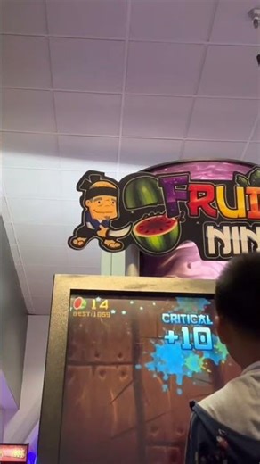 Playing Chuck E. Cheese arcade games(short)