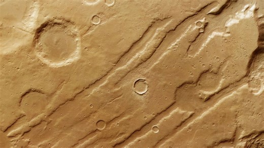Deep 'scratches' and craters on Mars tell the tale of a Red Planet ice age
