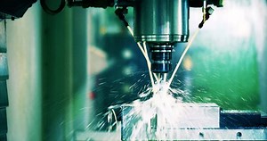 Finishing metal working on high precision grinding machine in workshop