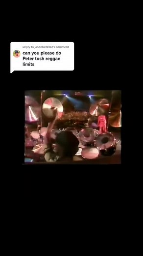 Energetic Live Performance of a Musician in Red Outfit