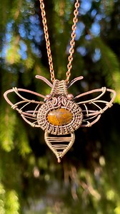 Here’s a process video for the bee pendant I made last week! 🐝 This one is already packaged up & ready to go home to an awesome repeat customer. 🥰 I can’t wait to show you what I have in store for this week’s shop update! Help me decide! Would you like to see more of this design in the future, or do you prefer my usual honeycomb design as far as bee themed jewelry goes? • • • #beejewelry #honeybee #bees #honeycomb #handmadejewelry #jewelrymaking #wirewrapping #wirewrappedjewelry #springjewelry