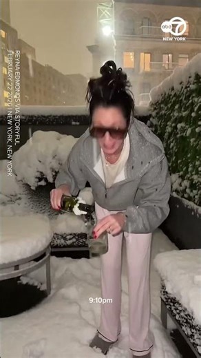 Blizzard of 2026: Woman uses wine bottle to measure snowfall in NYC