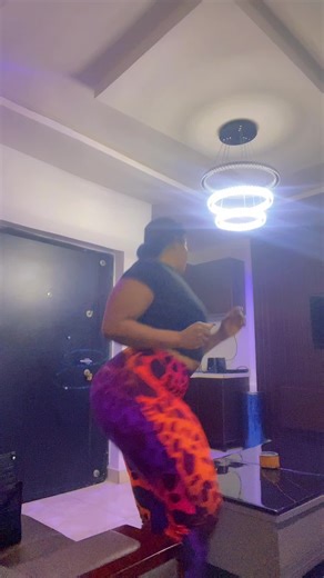 Changing a Light Bulb in a Modern Kitchen