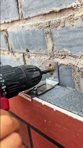 Securing metal bracket to brick wall precisely