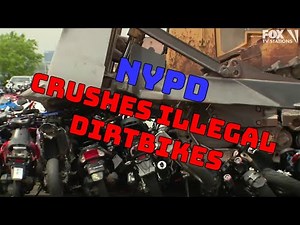 NYC bulldozer crushes illegal motorbikes at impound lot in Brooklyn