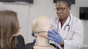First aid training session at the clinic with hands-on practice on a CPR mannequin