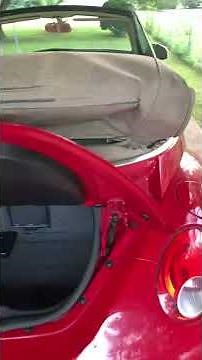 2007 Volkswagen Beetle How to eject 6 Disc CD Changer from trunk