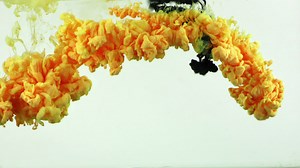 Download Yellow and Black Paint Spread Underwater for free