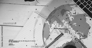 Drifting dots initiating code fragments and overlay forming and fading around notebook showing data