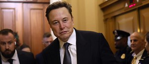 FACT CHECK: Facebook Video Purporting To Show Robot Cutting Elon Musk’s Hair Is AI-Generated