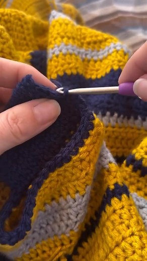 A Perfect DK Weight Striped Sweater! Comment 𝗠𝗩𝗦𝗞 and I’ll send you the link to make your own Modern Varsity Sweater! You will love this perfectly striped sweater made with Wool Ease DK from Lion Brand Yarn in Goldenrod, Navy and Quiet Grey! I love this color combo but you can choose any color combo you want! It fits wonderfully with the modified drop shoulder construction and perfectly shaped crew neck! That means less bulk in the arm area and no uncomfortable necklines that rub! Plus, I pa