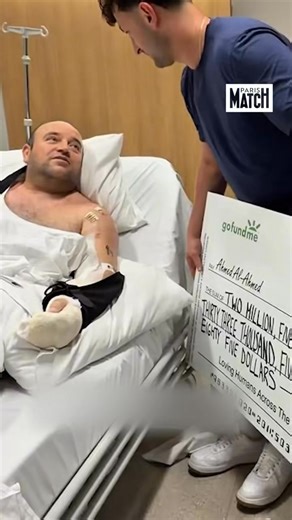 🇦🇺 Le héros australien honoré par une vague de solidarité �L’homme salué par le Premier ministre Anthony Albanese comme un « héros australien », après avoir désarmé l’un des assaillants lors de la fusillade de Bondi Beach, a reçu à l’hôpital un chèque symbolique de près de 2,6 millions de dollars. Au total, 44 000 dons ont été réunis via une cagnotte officielle sur GoFundMe. Alité, Ahmed al-Ahmed s’est vu remettre ce chèque surdimensionné par Zachery Dereniowski, influenceur et co-organisateur