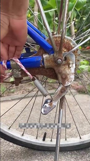 Clever installation process of bicycle support frame spring with a rope