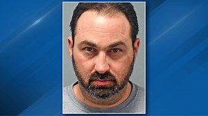 Local man faces dozens of charges for allegedly secretly photographing nude minor