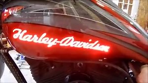 Gator Glass Tanks! We illuminate custom logos and airbrushing on your gas tank. Visit www.GatorCustoms.net for an estimate request. | Gator Customs