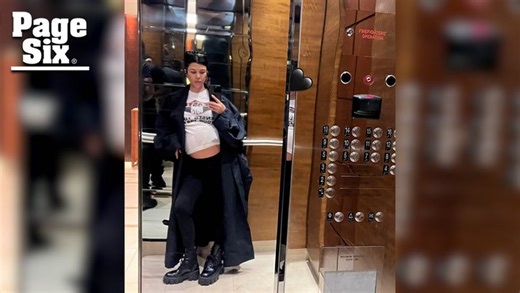 Pregnant Kourtney Kardashian gives glimpse of growing baby bump in elevator selfie