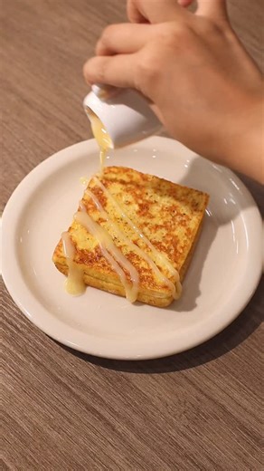 🧀🍞 Cheesy French Toast 📝 Recipe Bread Sliced Cheese 1 Egg 30ml • Milk 1 tsp • Ground Cinnamon 1 tbsp • Butter 30g • Sweetened Condensed Milk Instructions: * Bread & Cheese: - stack bread with sliced cheese inside * Egg Mixture - crack open 1 egg in a plate - pour milk - add ground cinnamon - whisk the egg mixture until it’s mixed well * Cooking; Bread - heat the pan and melt butter in medium heat - dip / coat the bread all over with the egg mixture - fry the bread on the pan, flip, add anothe
