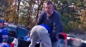 Buffalo Bills Fan Got Folded In Half As His Buddy Viciously Power-Bombs Him Through a Table [VIDEO]