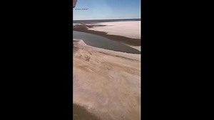 Rare natural phenomenon has the world flooding to Lake Eyre