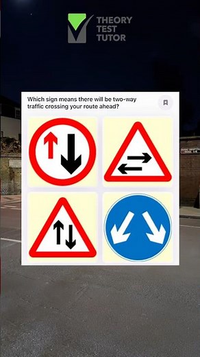 Which sign means there will be two-way traffic crossing your route ahead?