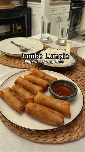 As Told by The Dons 🇵🇭🇺🇸 on Instagram: "Jumbo lumpia 🥰 Filipino spring rolls for dinner tonight! My husband has been craving lumpia for a while now but it kept getting pushed back. Happy we finally found time to make it. He’s already requesting fresh lumpia (lumpiang ubod), the last time we had that was at our wedding 5 years ago 👀 Hope I can find all the ingredients at the Asian store! PS. Calling it jumbo because it’s way bigger and chunkier than the traditional lumpia hehe #homecooking 