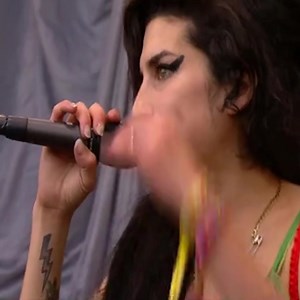 Amy's journey across the Glastonbury stages spanned three impactful performances. In 2007, she headlined on the Pyramid Stage, echoing the success of her acclaimed album, 'Back To Black'. 💞 | Amy Winehouse