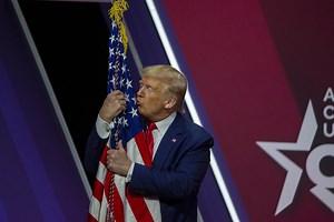 Watch Trump Kiss and Caress an American Flag at CPAC: “I Love You, Baby”