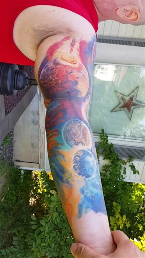 Exploding Galaxy Sleeve Tattoo Design for Steve