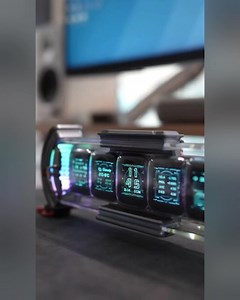 1K views |  Black Friday Blowout!  “Still staring at a boring desk clock?” Upgrade to the Times Gate — a sleek cyber-punk inspired pixel art display with live stats & animations! ️ 5 full-color LCDs + pixel-art edit mode  Shows live weather, game stats, follower counts  Fits any modern desk or gamer setup  Grab your deal before it’s gone! | Divoom Global | Facebook