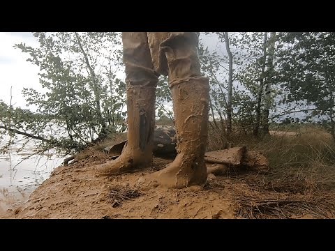 Waders and rubber rainwear in mud 2