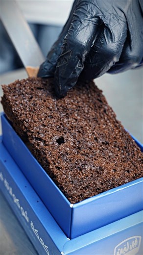 Feel Laban on Instagram: "From batter to box – watch the magic happen 😍🍫 Our Fazea Chocolate Cake is crafted with rich chocolate, silky topping, and loads of love. Swipe through the layers of sweetness as we make your new favorite dessert! #FazeaChocolateCake #ChocolateCake #ChocolateLovers #CakeMaking #DessertReel"