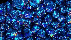 Realistic 3D animation of the blue sapphire crystals falling from the top filling up the volume rendered in UHD with alpha matte