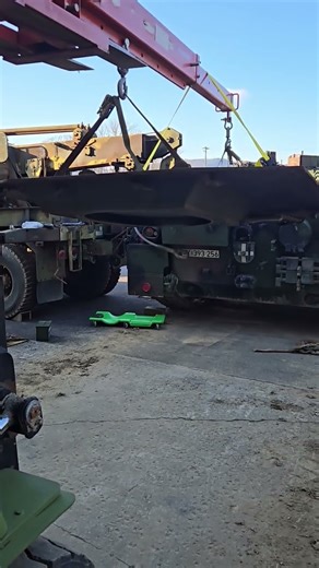 Removing Leopard tank engine cover. #Leopard #tank #repair #military