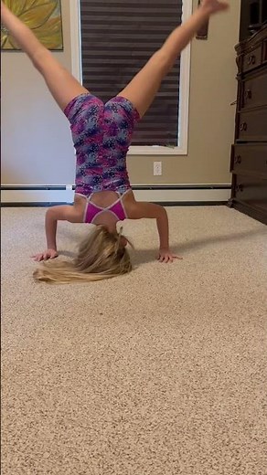 Gymnastics contortionist headstand splits