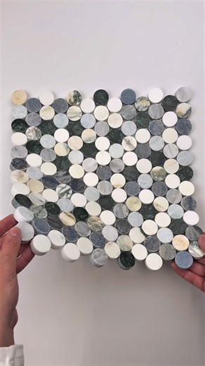 Modern art… but make it marble tile. 🎨✨ Our new Geometria Collection brings color, pattern, luxury & durability in one jaw-dropping mosaic. Perfect for bathrooms, floors, backsplashes & entry moments that deserve the spotlight. Comment GEOMETRIA for the link to samples. 💚🖤🤍 | Tile Club